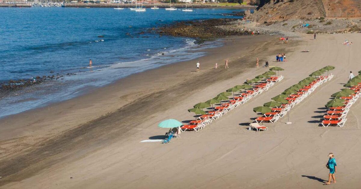 Playa de Meloneras en foto de archiv